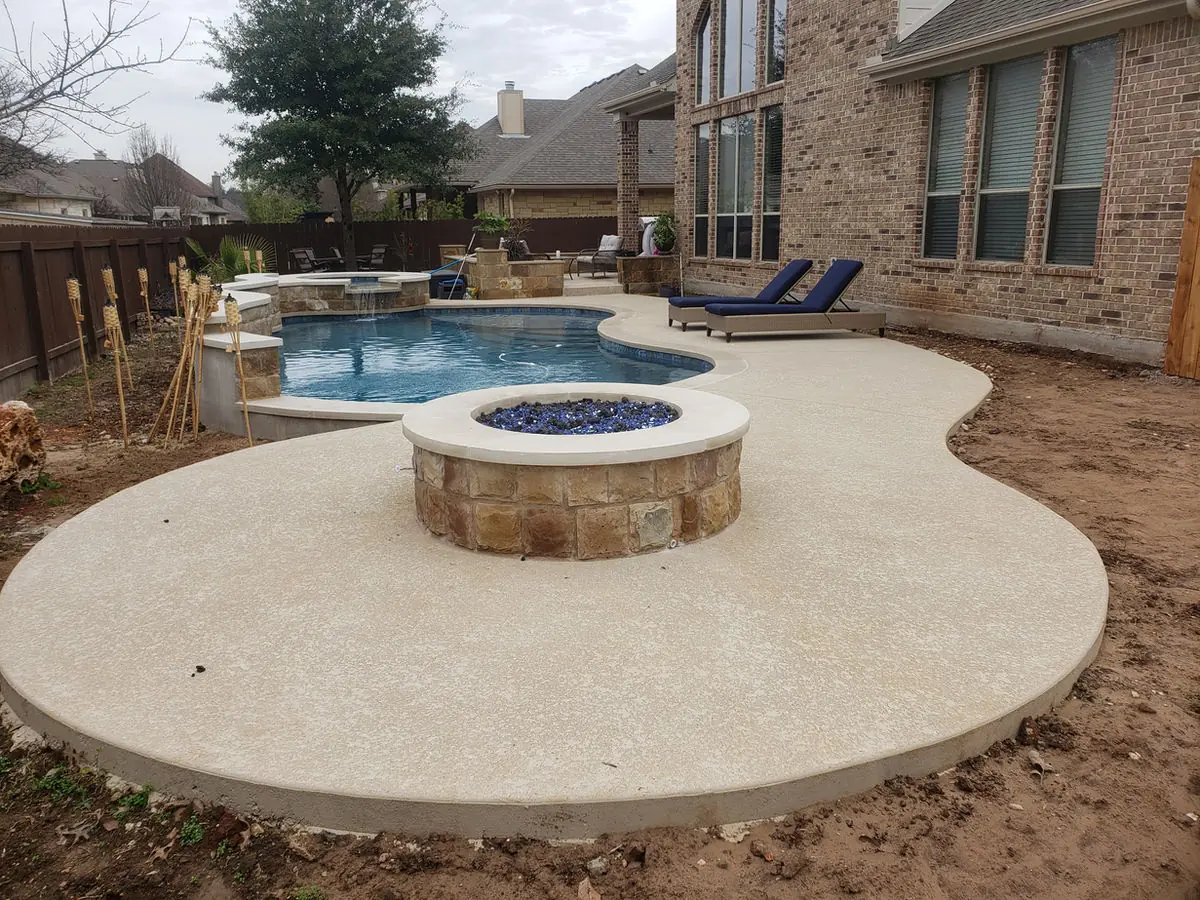 Pool, spa and fire pit on a curved deck